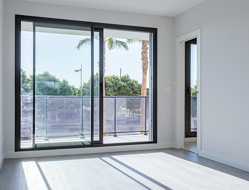 Porte coulissante aluminium Strugal Tanger - baie vitrée balcon